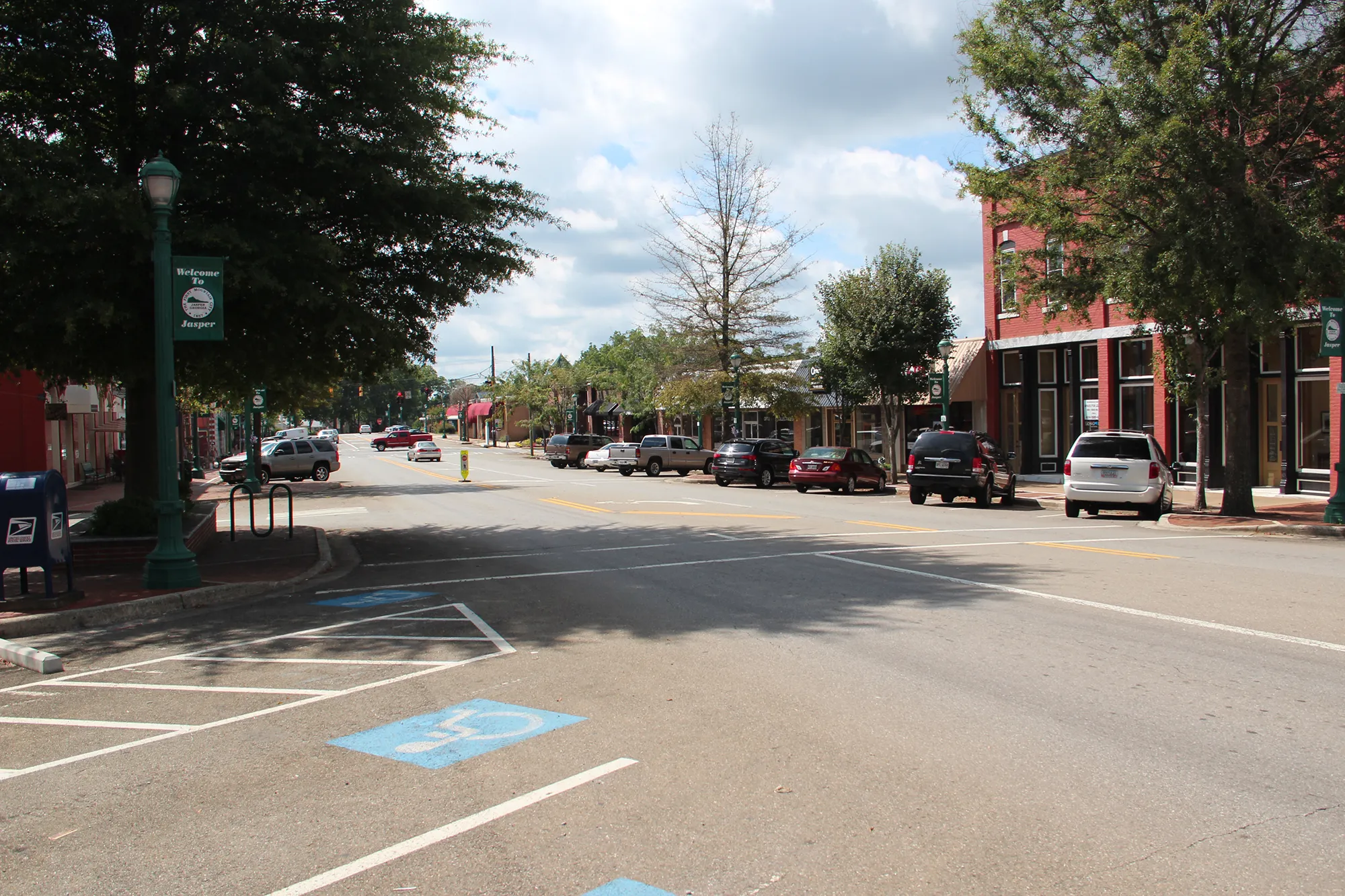 Downtown Jasper, Georgia with historic buildings and scenic Blue Ridge Mountains backdrop